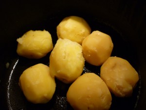 I peel and then boil the potatoes, but as long as they’re cooked it shouldn’t matter how it’s accomplished.  The potatoes work best if they’re cooled.3 pounds cooked potatoes, peeled