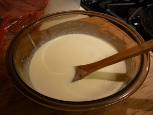 Beat in 2 eggs. Dissolve ½ tsp. baking soda in 1 Tbsp. water and gently fold it into the batter. Do not stir it any more. 
