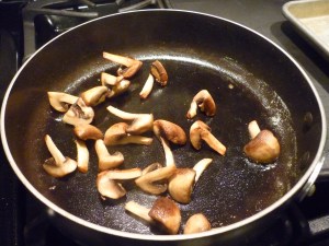 Cut medium-size mushrooms into quarters and brown in butter and olive oil. Set aside. 