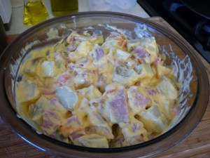 Remove from heat and stir into potatoes and ham. Stir in 4 ounces of sliced pimiento. 