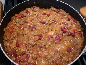 Remove from heat and stir in a handful of grated cheese. 