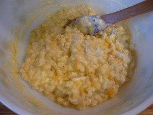 Beat 4 ounces softened cream cheese, a 15-oz. can creamed corn, a 15-oz. can whole corn, 1/2 cup cornmeal and 1/2 chopped onion.