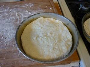 Cut a cross in the top of each loaf with a floured knife.