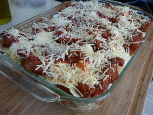 As you can see, the sauce is dolloped on, not poured. Here is what it looks like just before going into the oven.