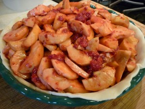 Pour into pie crust. Dot with butter. Cut slits in top crust. Put on top crust. 