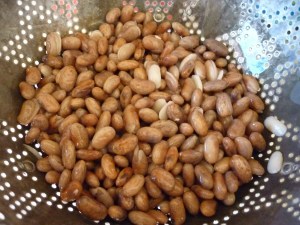 Put 1/2 # dried pinto beans into pan and cover with water to at least 2” above the beans. Bring to a boil and boil 3 minutes. Remove from heat, cover, and let stand at least 1 or up to 4 hours; drain beans and pour into bowl.