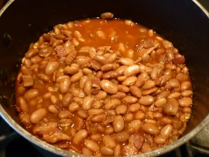 Cover and simmer until beans are tender to bite.