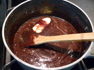 Bring to a boil in a medium pan and boil one minute: 2 cups sugar, ½ cup cocoa, ½ cup milk, 1 stick butter (1/2 cup), Dash salt 