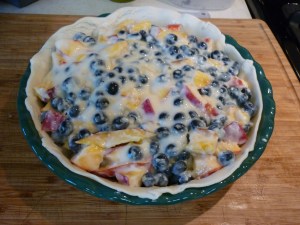 Fruit mixture goes into the crust.