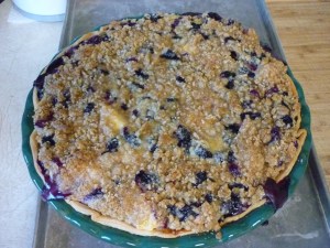 When the fruit bubbles and the streusel is golden, remove from oven.