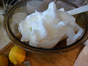 The first thing I do is beat the egg whites in my mixer, then transfer them to a bowl and set aside. Next I use the mixer to mix the remaining ingredients according to the recipe. Then I fold the egg whites back into the mixing bowl with the other ingredients on slow speed until they're incorporated.