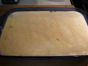 Gently pour bechamel sauce over the entire dish and sprinkle with 1/2 cup Parmesan. Bake at 350 degrees for one hour. Yummy!