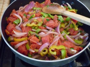 Add tomatoes and parsley and heat through.