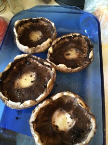 Rub each mushroom cap with olive oil on both sides as best you can.