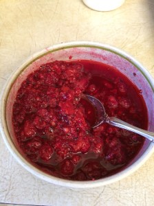 Place raspberries in a small bowl and sprinkle with sugar. Mash the berries with the sugar a little bit. Set aside for at least 15 minutes.