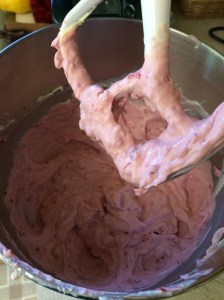 Mix yogurt and pudding mix together in mixer on low speed. Add cream and mix on medium speed until fully incorporated and fluffy. Stir in raspberry-sugar mixture on low speed.