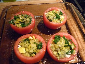 Sprinkle feta crumbles into the bottom of each tomato, then add a layer of filling, more crumbles, and then more filling. 