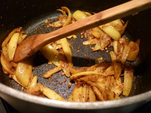 Stir in the turmeric and saute for 2 minutes longer, then add the paprika, cumin, coriander, and cardamom. Continue to saute for another 2 minutes. Transfer the mixture to a bowl.
