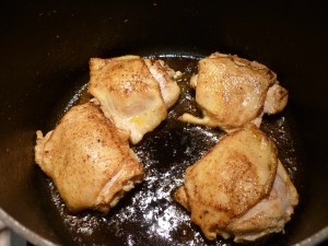 Heat more olive oil in the pot and brown the chicken pieces in two batches. The turmeric from the bottom of the pot should color the chicken. If not, sprinkle with a pinch more turmeric.