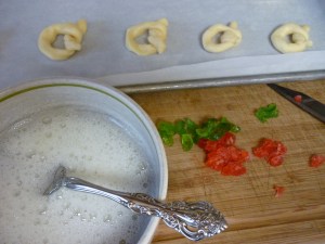 Beat egg white until foamy; add 2 Tbsp. sugar, 1 Tbsp. at a time, while beating. Brush tops of cookies with sweetened egg white.